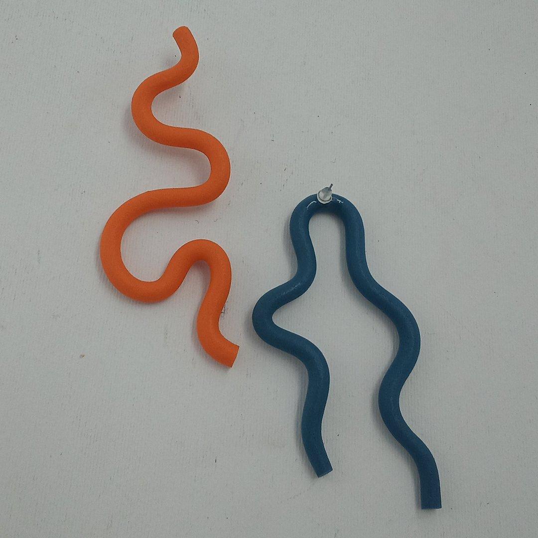 گوشواره دفرمه تک لنگه اده